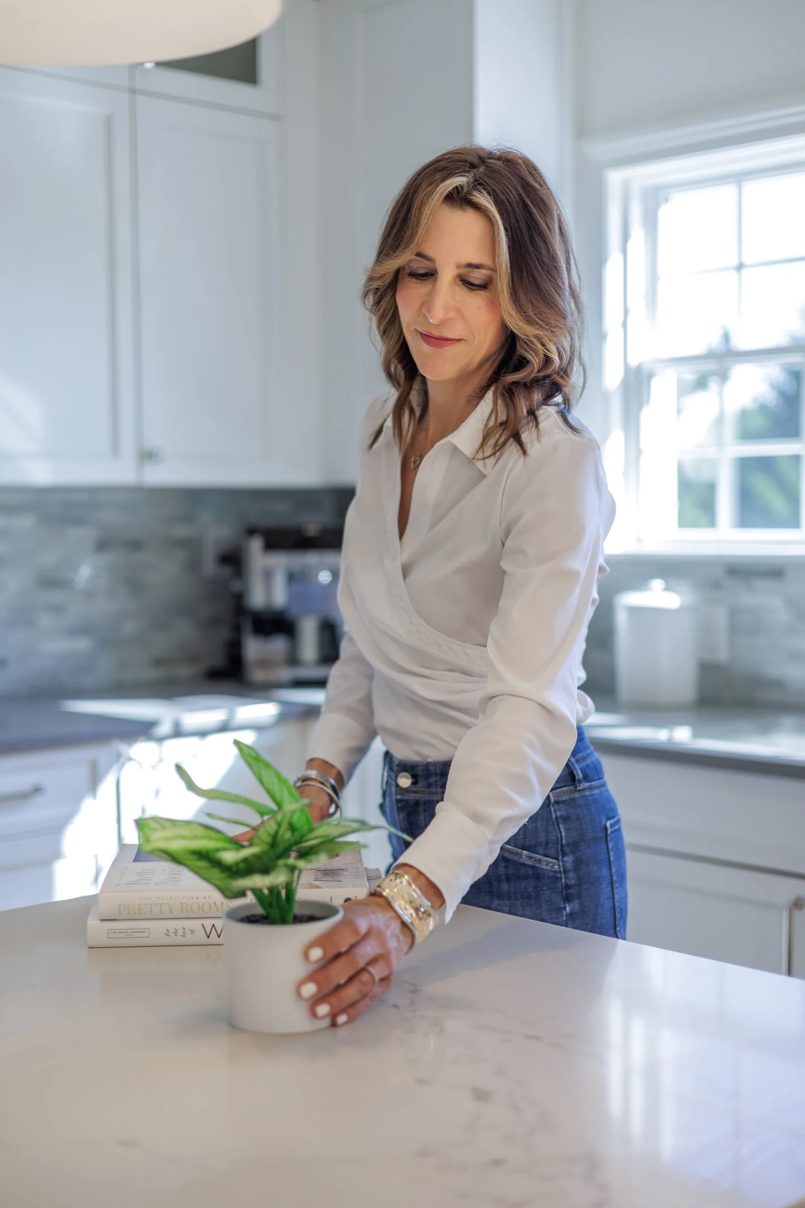 Real estate agent lifestyle portrait in kitchen — environmental headshot, Westchester County NY